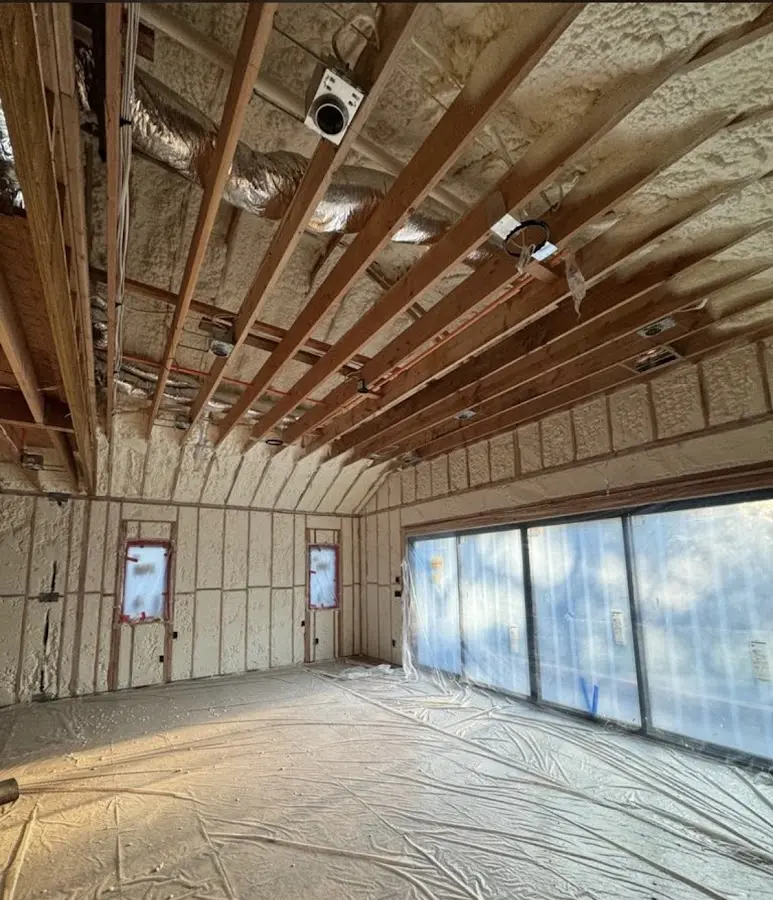 Interior walls and ceiling insulated with spray foam during new construction in Santa Teresa